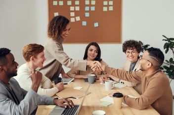 Colleagues collaborating around a table